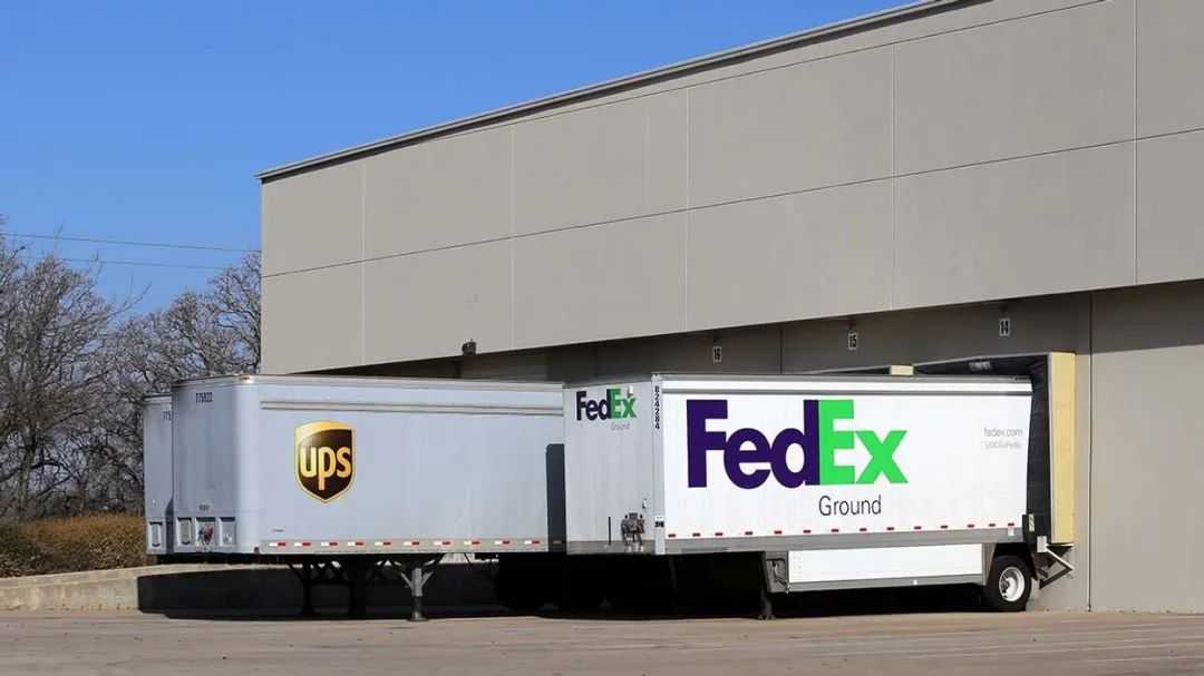 ups and fedex trailers at the dock